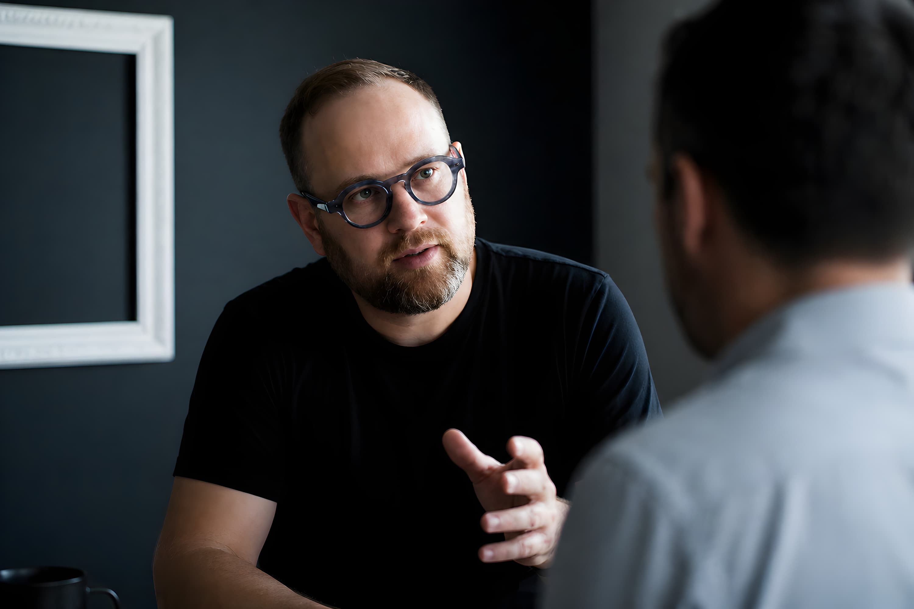 Thom Van Dycke in a working session with a client