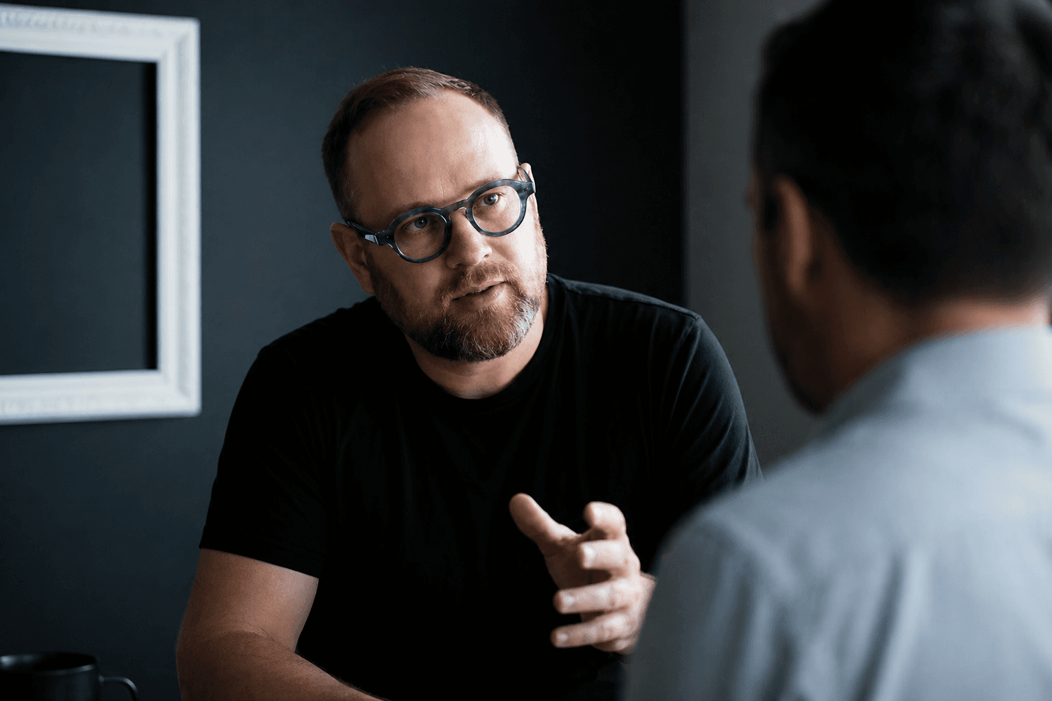 Thom Van Dycke in a working session with a client